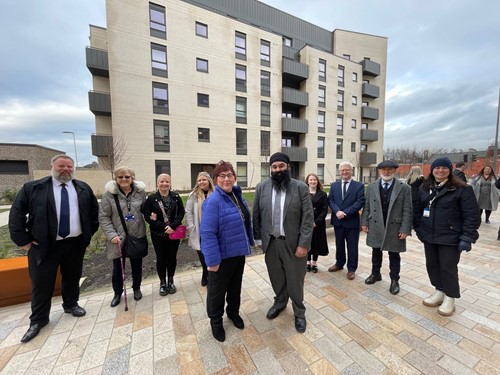 Officials at the opening of Queens Quay Housing