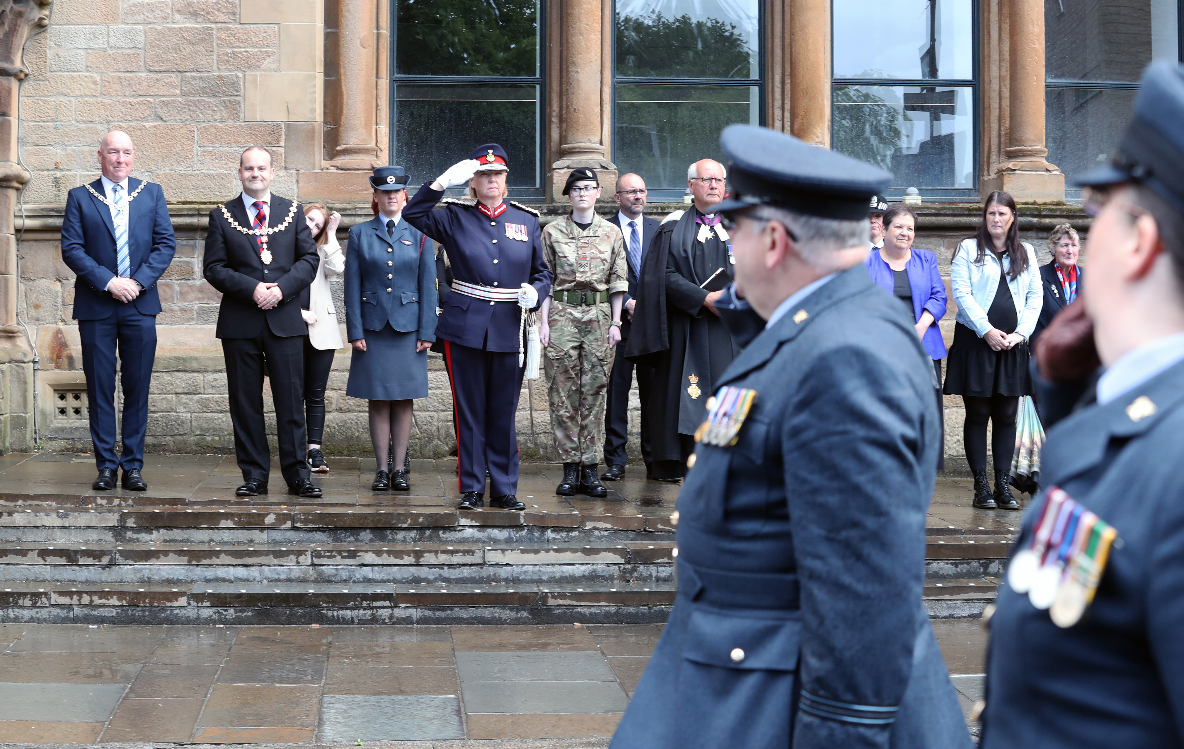 Lord Lieutenant salutes members of the Armed forces day parade along with councillors  