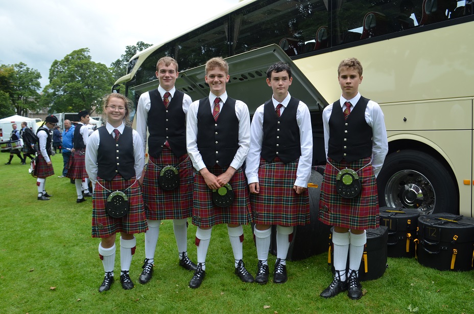 image of pipe band at coach