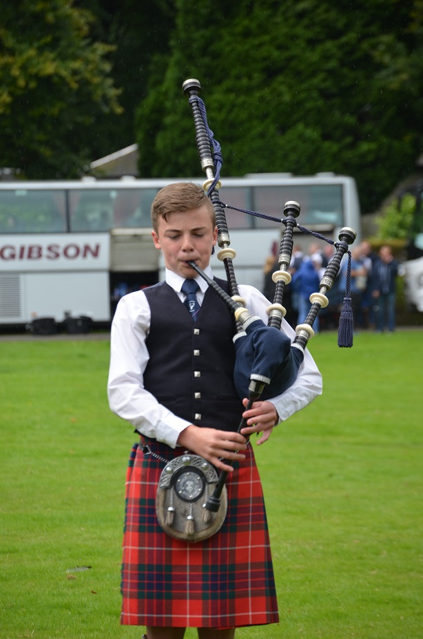 image of playing bagpipes