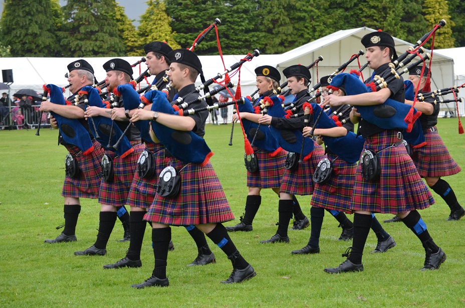 image of marching with bagpipes