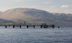 Pier on Loch Lomond with the hills in the background