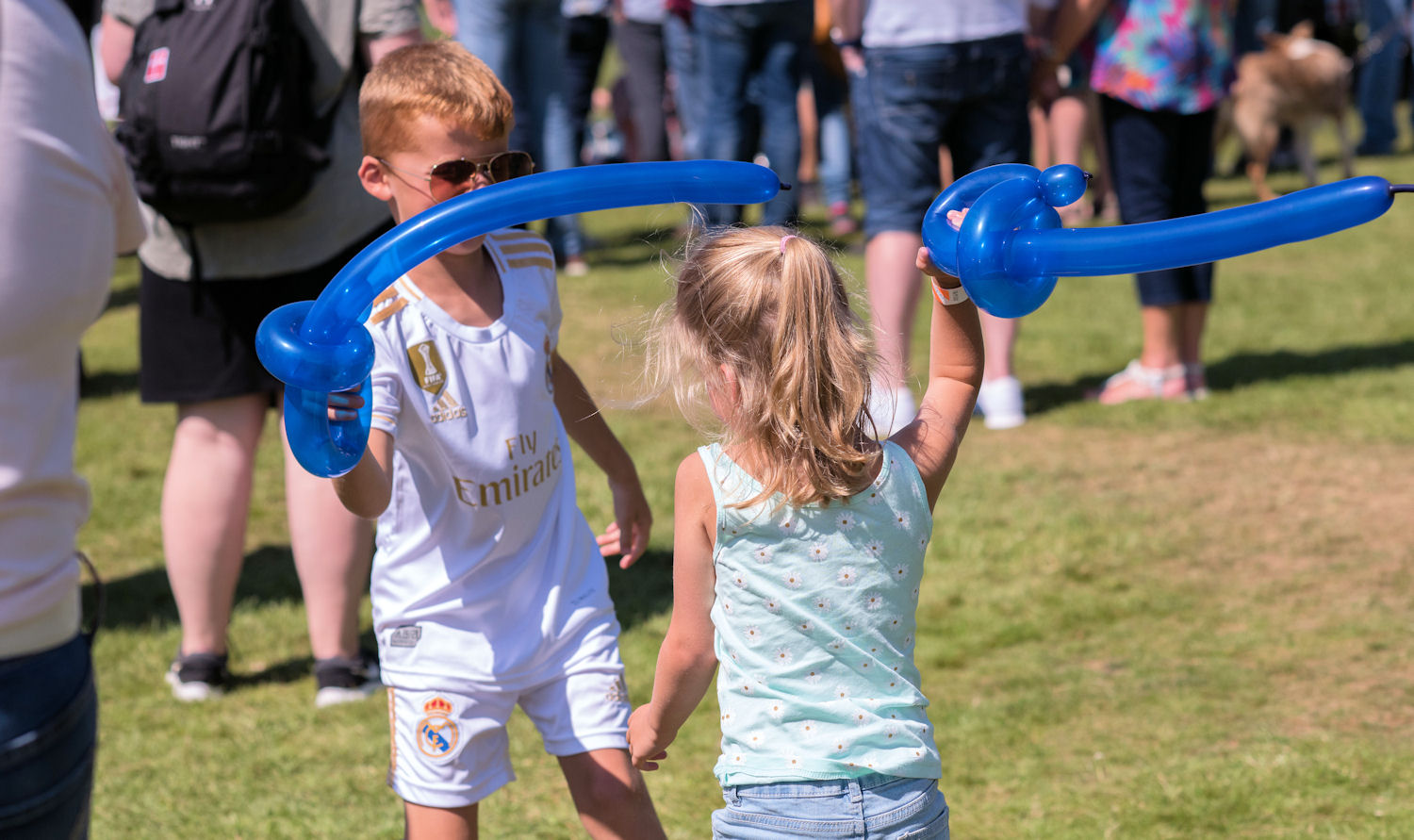 image of Highland Games kids playing with balloons