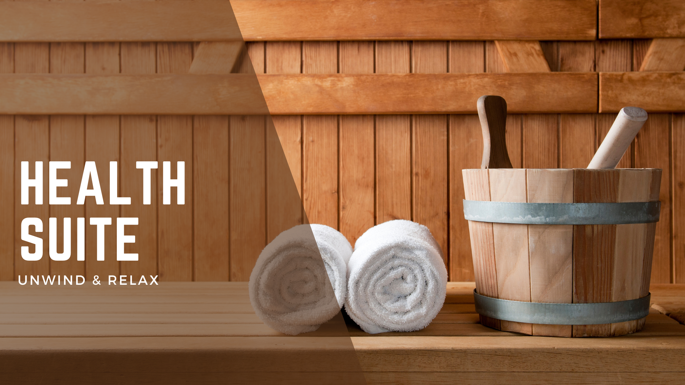 White Towels and a wooden water bucket in the sauna - Health suite membership