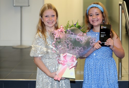 Zoe Neeson (in Blue) with her Youth Champion Award