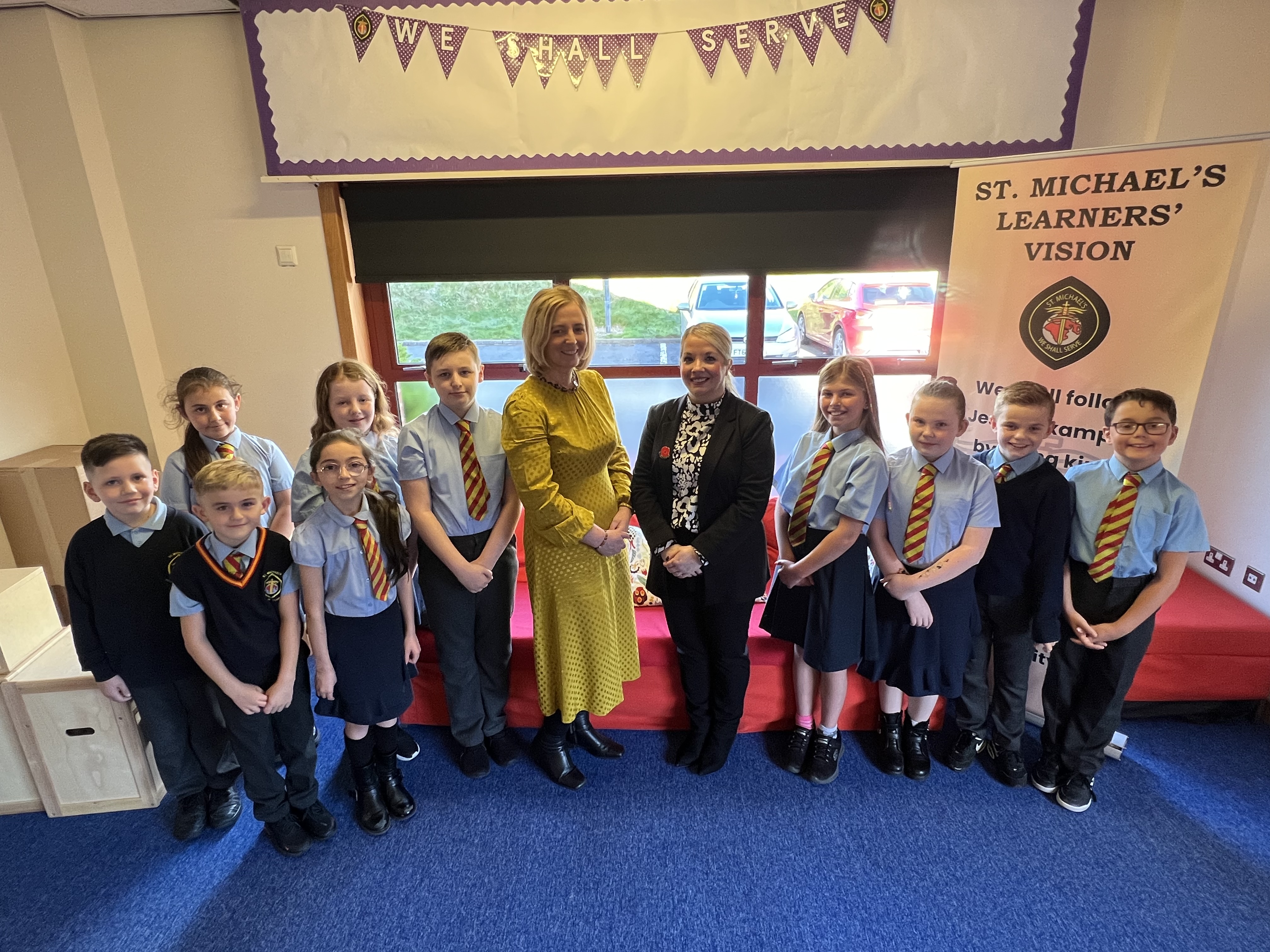 Cllr Clare Steel with Head Teacher Jennifer Mulvenna and pupils from St Michael's Primary