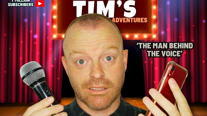 Tiny Tim poster holding mic and phone