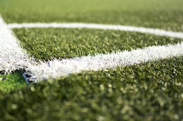 White lines marking out the corner of an artificial football pitch
