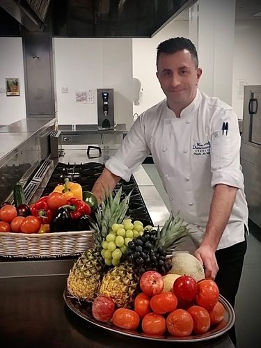 Donald McInnes in school kitchen