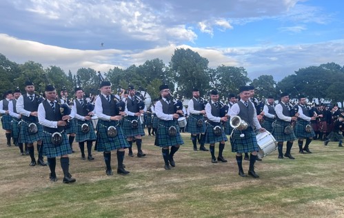 Inverary and District Pipe Band march with winners trophy