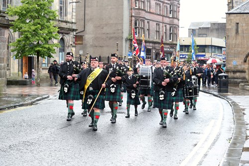 Pipe band leads the armed forces parade