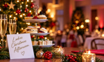 Festive afternoon tea with cakes, Christmas decorations and glasses of sparkling wine