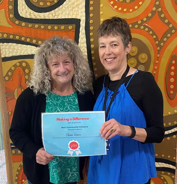 Elaine from Westbridgend TRA and Jane planting bulbs.