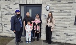 Sania Ishtiaq, her husband Amirmehmood, her son Huzaifamehmood and daughter Hadiyaamir with Convener of Housing, Councillor Gurpreet Singh Johal and Strategic Housing Officer Mikayla Deeley 